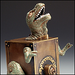 pinhole camera made from a brass box and a plastic dinosaur by Judith Hoffman